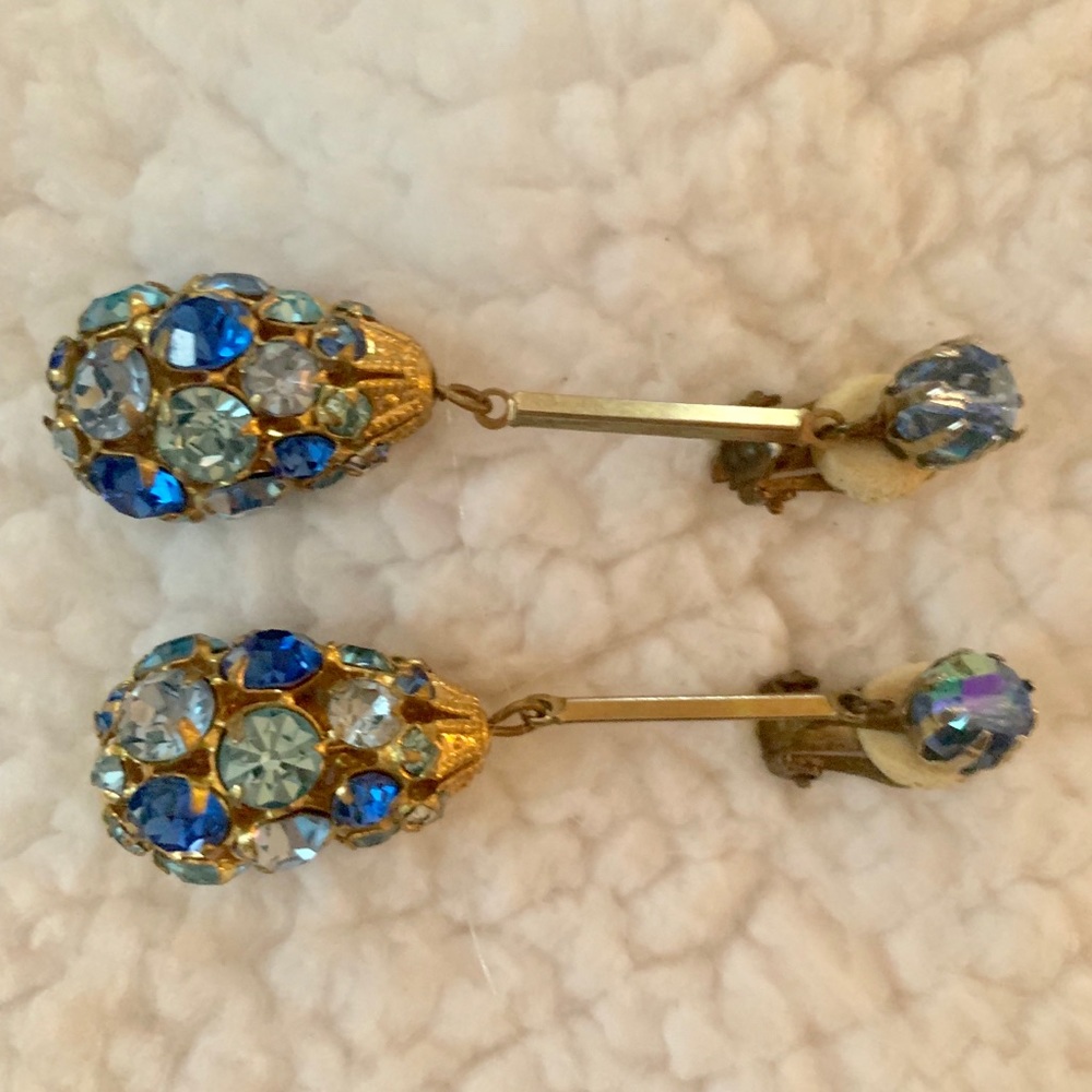 Earrings. Clips. Multi blue stones color .